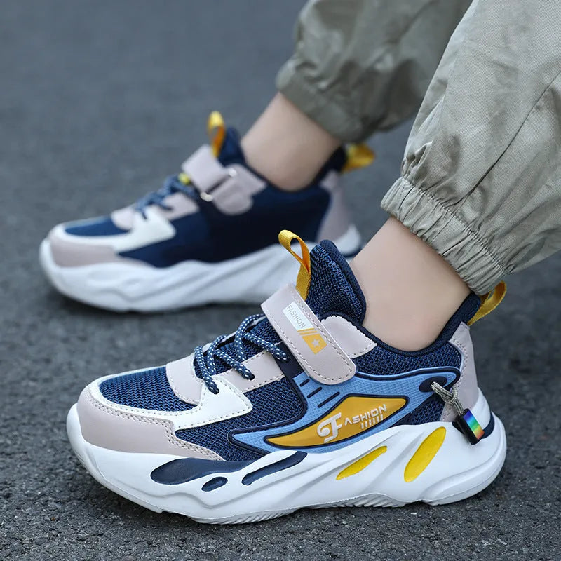 Boys' platform sports running shoes in dark blue with Velcro strap and mesh upper.