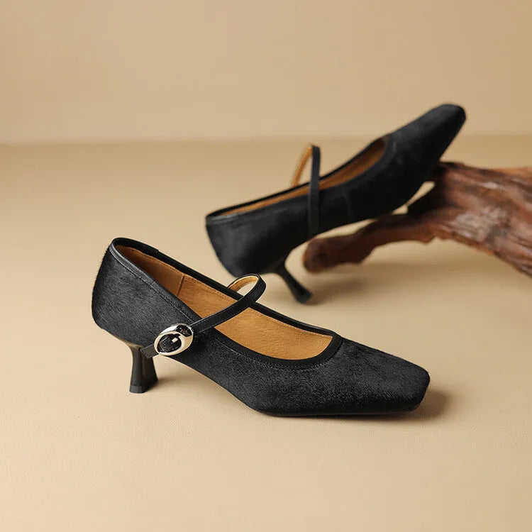 Women's black square toe stiletto ankle-strap high heel shoe made from horse hair.