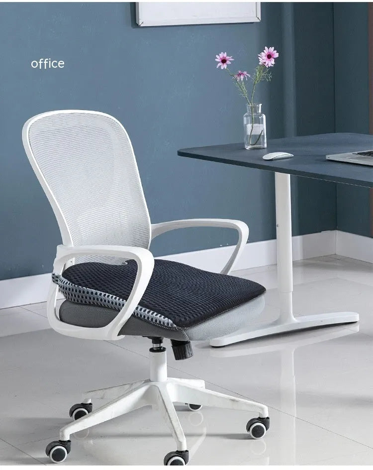 Memory foam car and office chair cushion with an attached fixed strap in a solid colour.