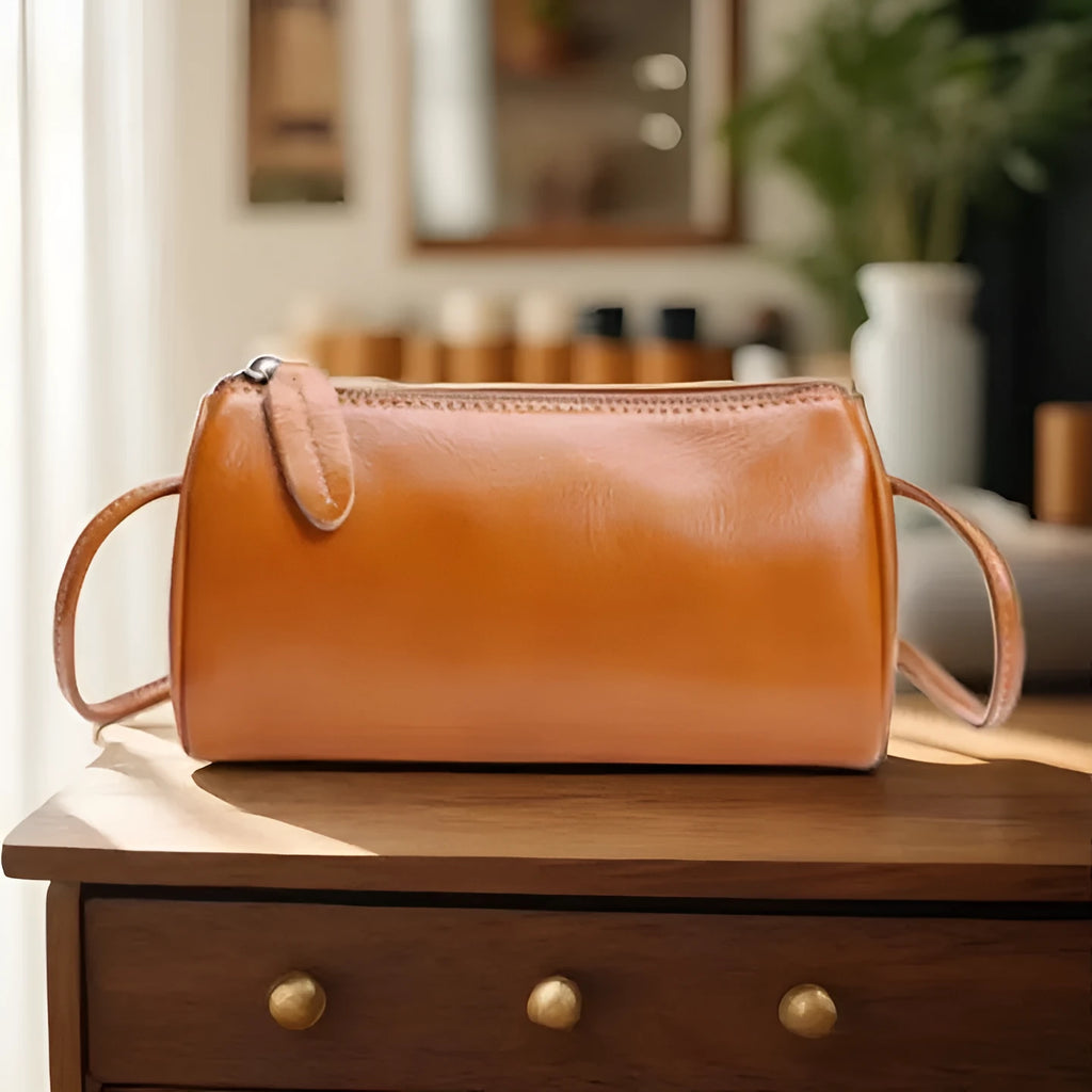 Women's genuine leather crossbody bag in pillow shape with retro splicing details, black colour, 20x8x15cm