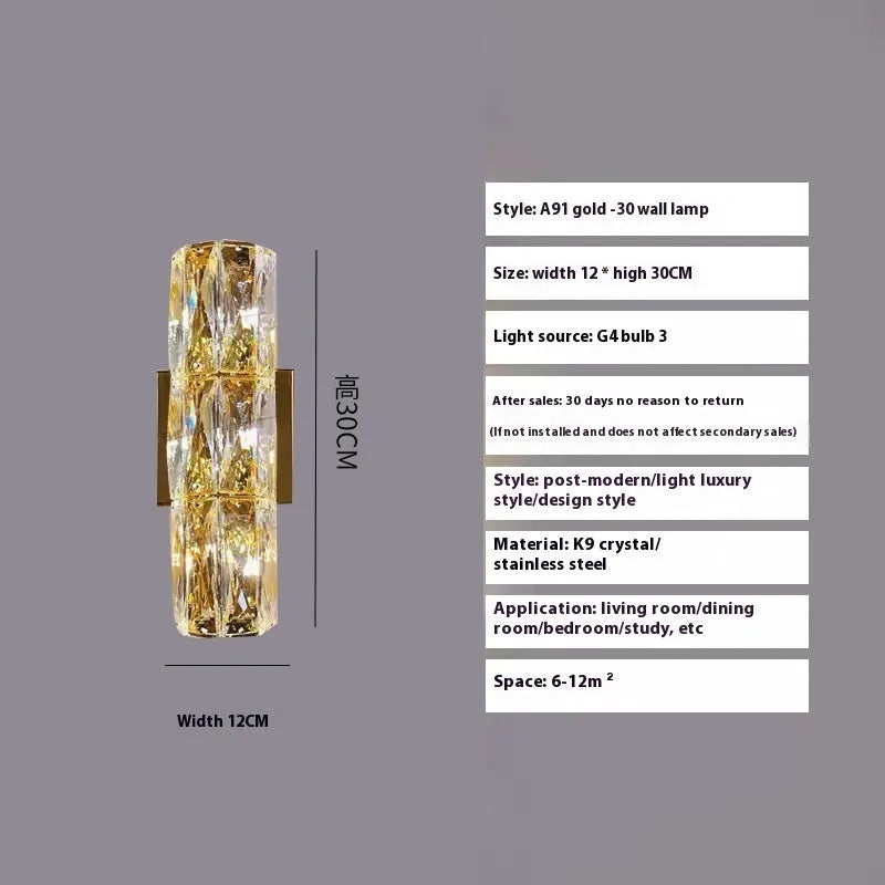 Slim crystal and stainless steel wall lamp with LED light on a wall.