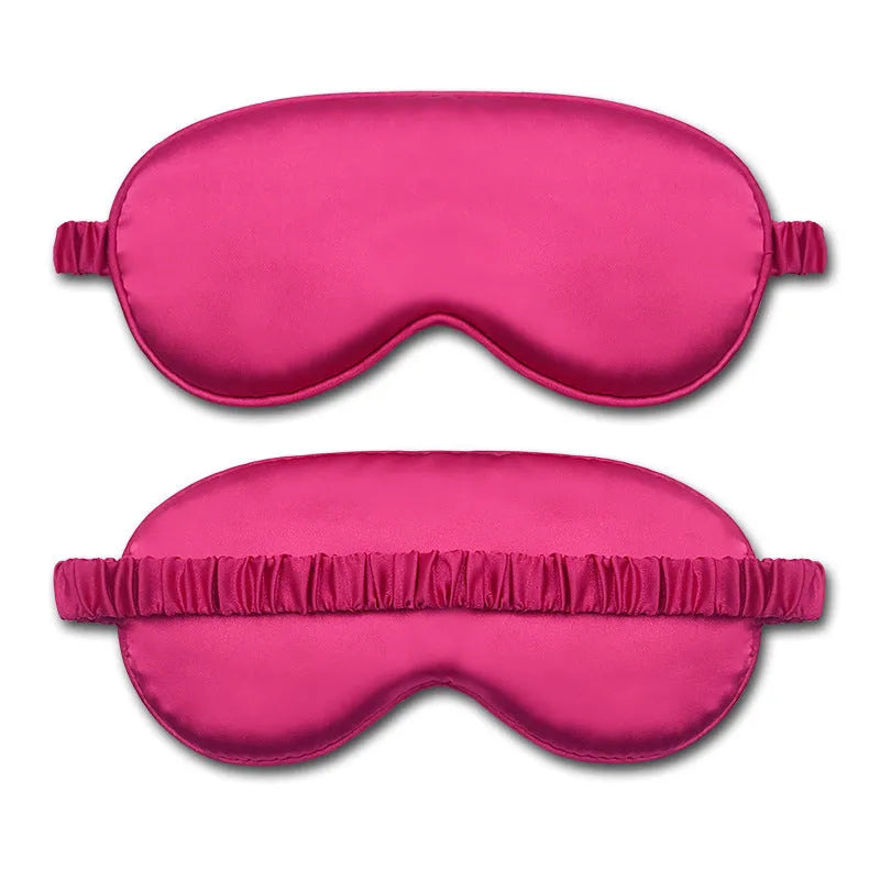 Reversible silk-like sleep eyeshade shown in multiple colour options including sky blue, wine red, and black.