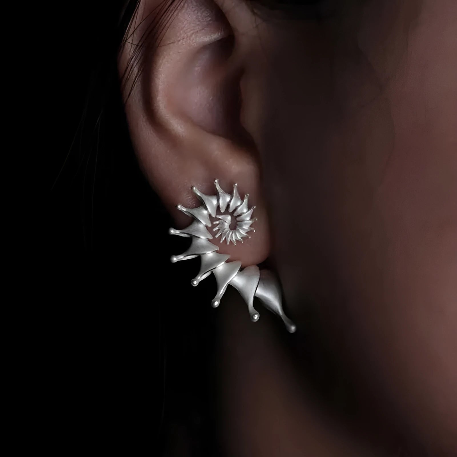 Exaggerated conch-shaped three-dimensional matte alloy stud earrings with electroplated finish