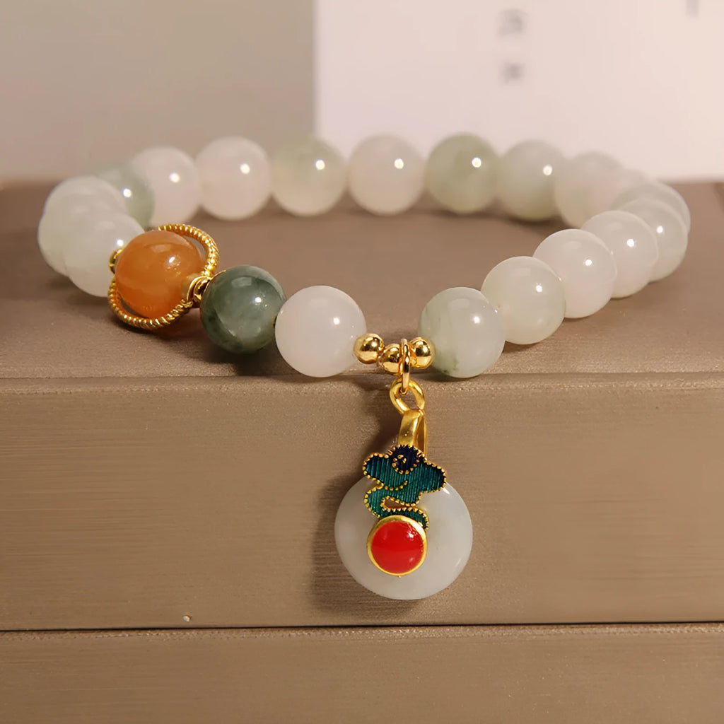 Women's ice jade and pearl bracelet with a retro-styled peace jade buckle.