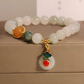 Women's ice jade and pearl bracelet with a retro-styled peace jade buckle.