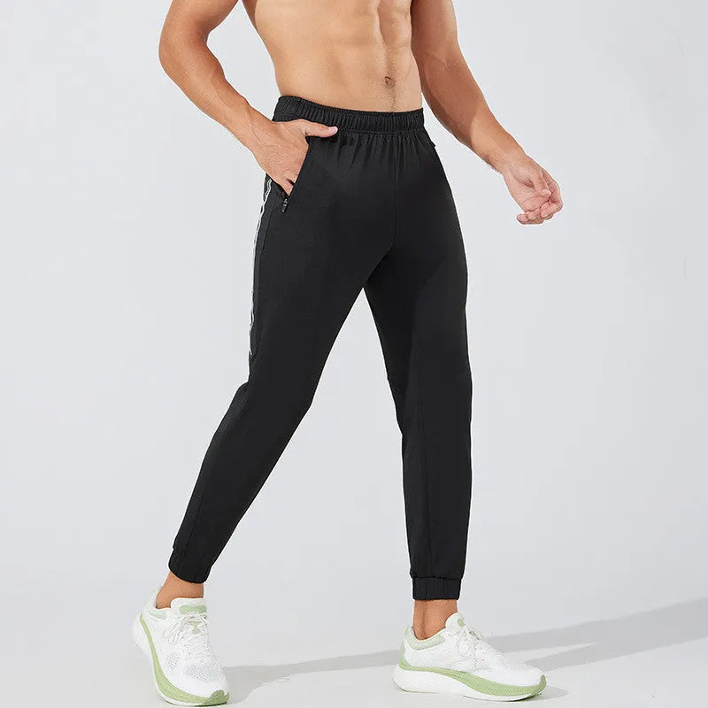 Men's black and navy blue running trousers with mid waist design and full length cut