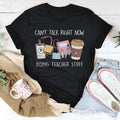 Black straight cut cotton summer T-shirt with round neck and short sleeves on hanger