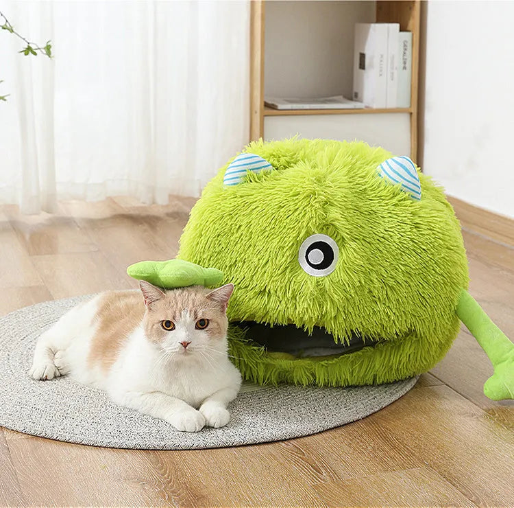 Round fluffy plush cat bed with non-slip base in three size options for indoor cats