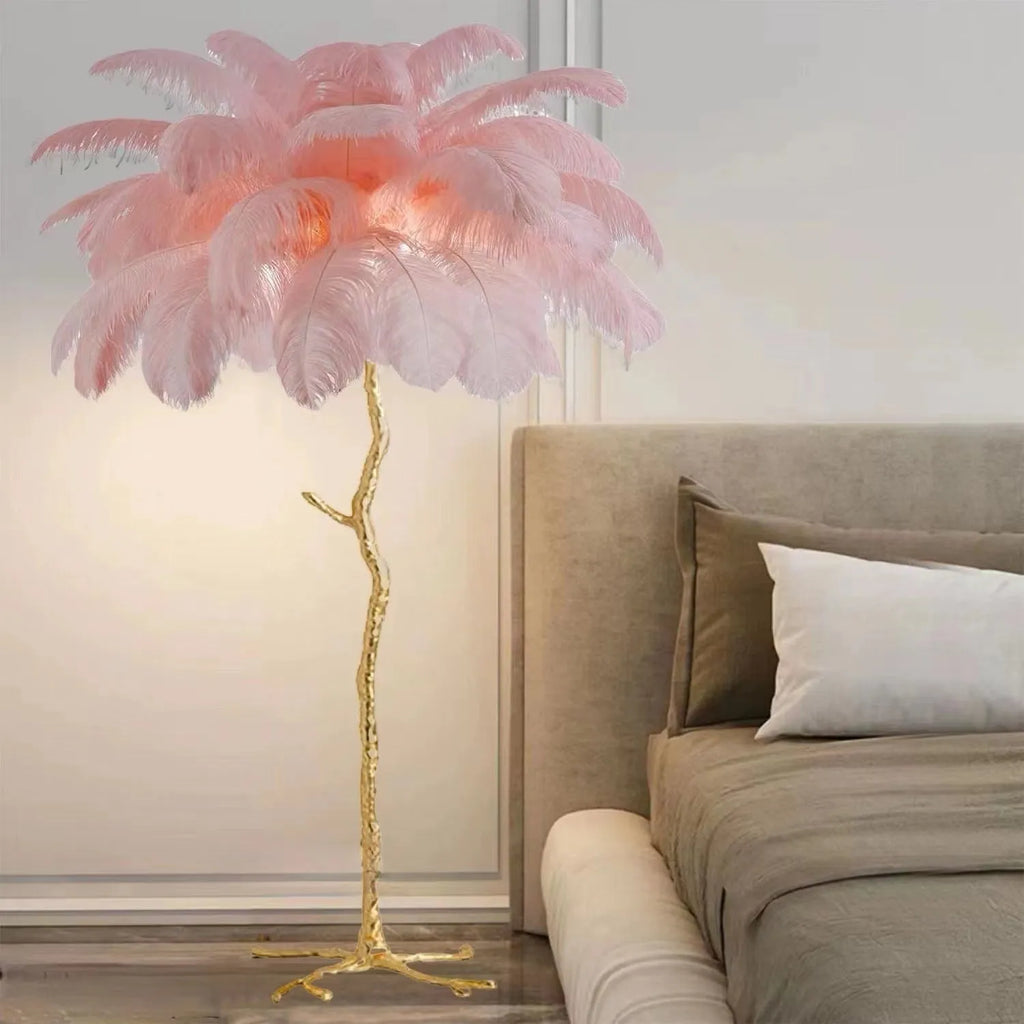 Tall decorative floor lamp with cluster of white resin feathers, standing 170cm high in a living room.