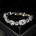 Women's sterling silver-plated bracelet with zircon stones in geometry design, shown in two size options