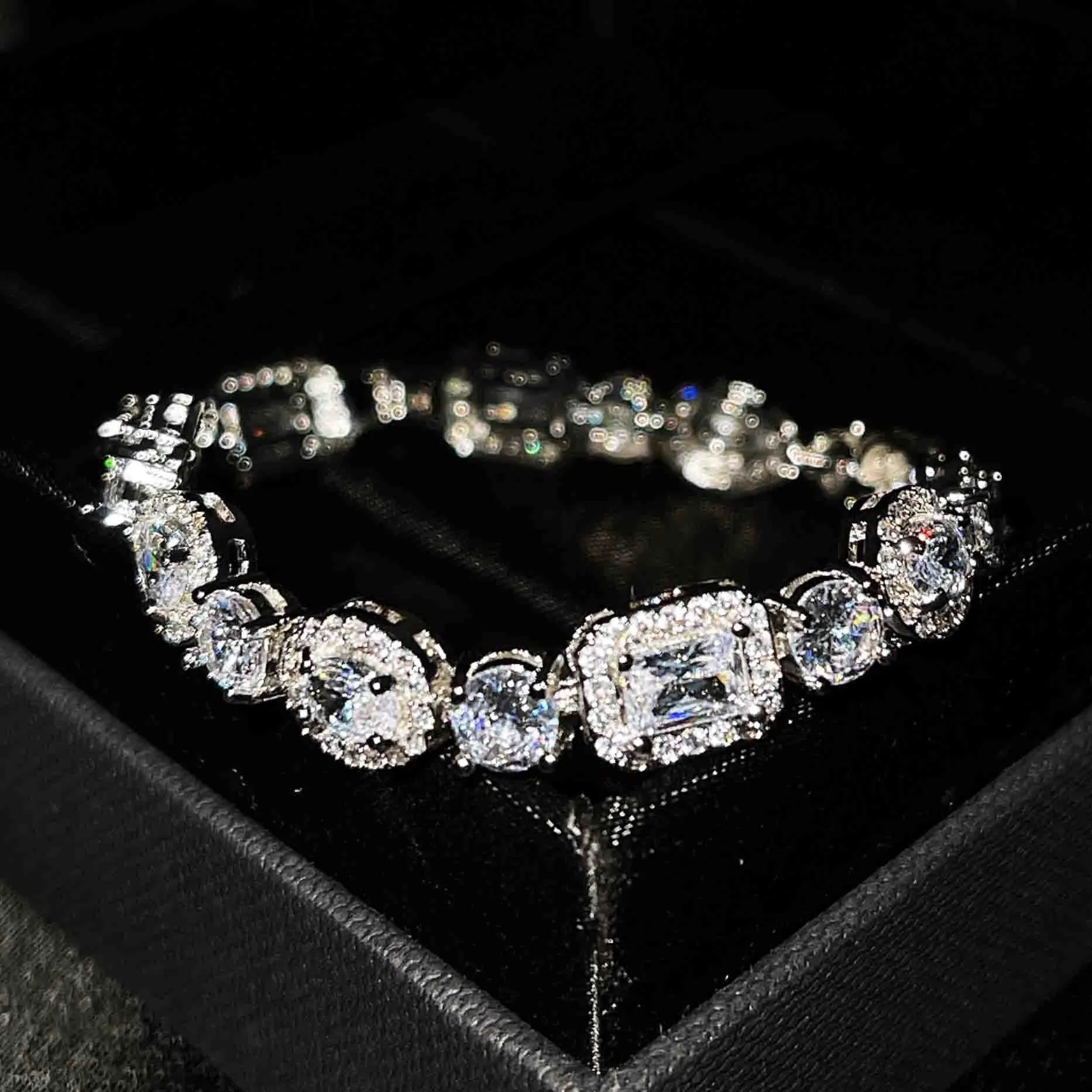 Women's sterling silver-plated bracelet with zircon stones in geometry design, shown in two size options