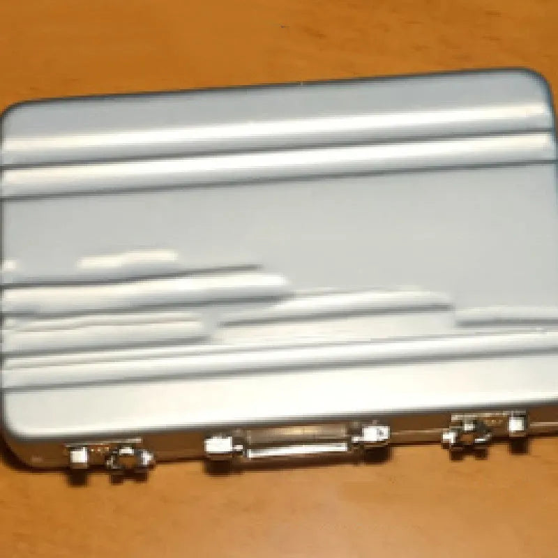 Aluminium alloy metal card holder in six colour options showing compact 100x65x16mm dimensions