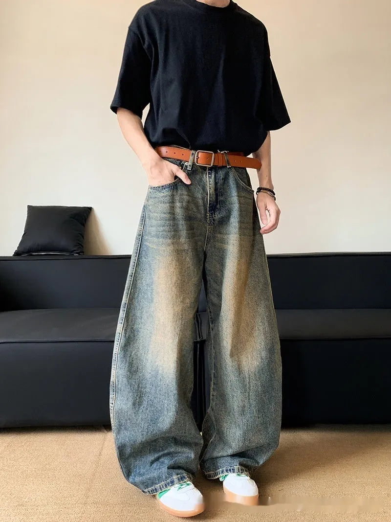 Men's retro blue distressed slim-fit wide-leg jeans on a model