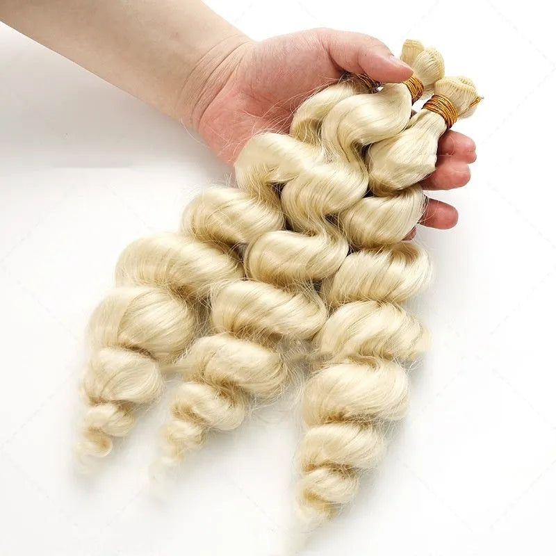 Golden synthetic hair weft in three lengths: 18in, 20in, 22in