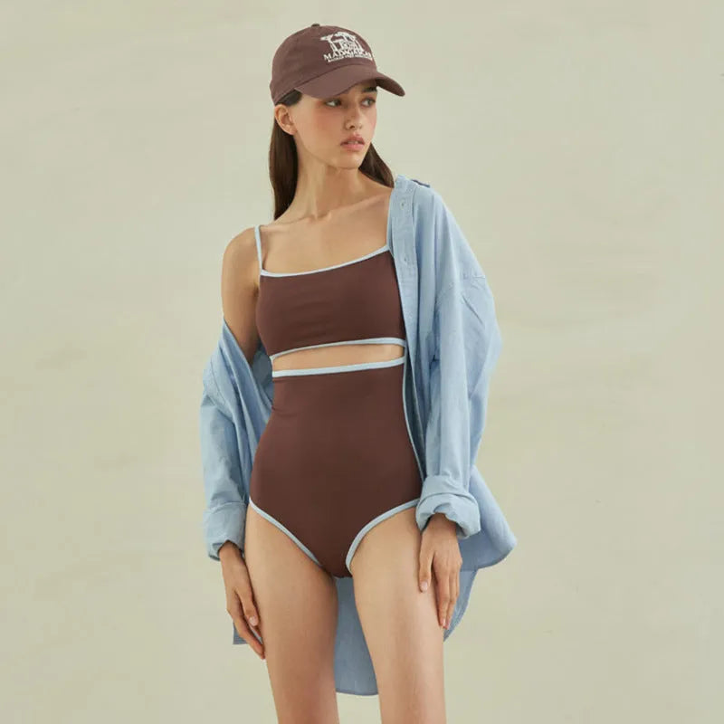 Brown nylon one-piece triangle swimsuit for women laid flat.