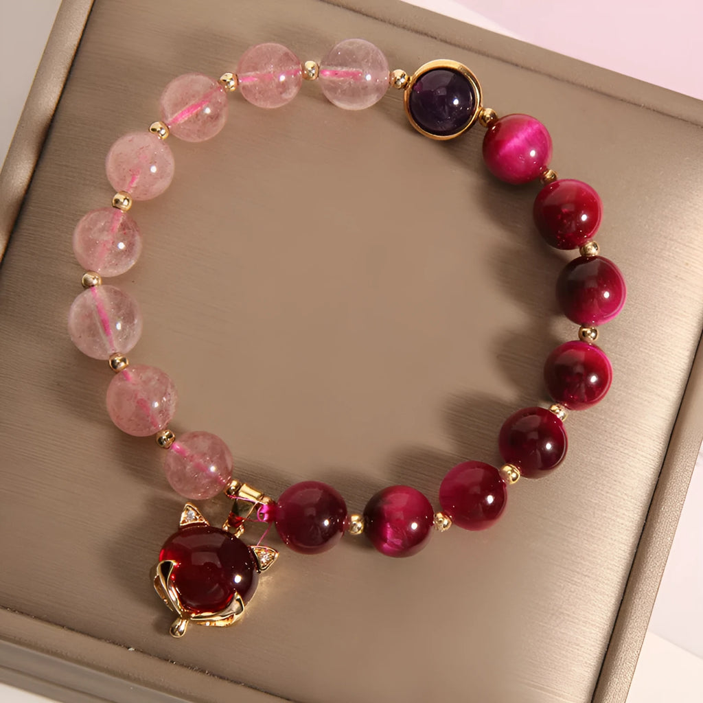 Women's simple bracelet with strawberry crystal beads on elastic rope, showing picture-accurate colour