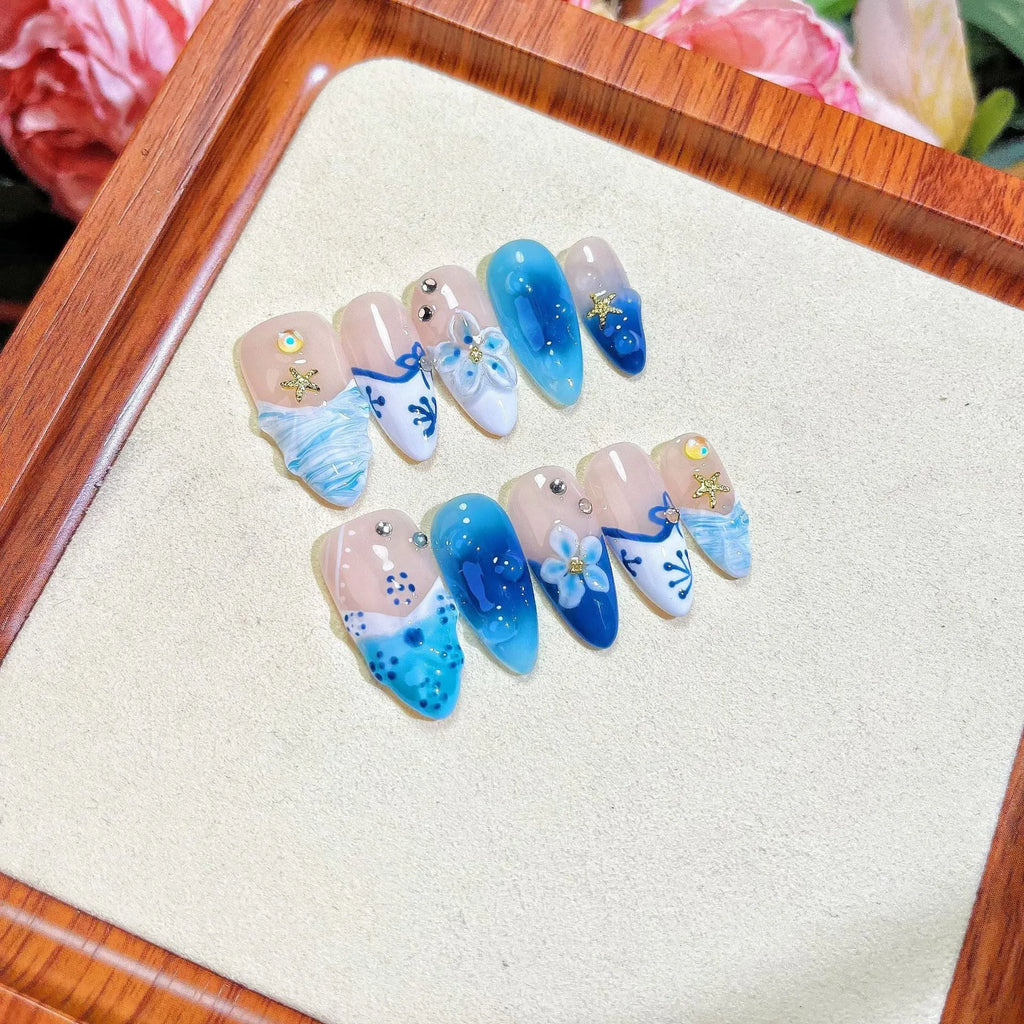 Blue hand-painted carved summer ice transparent false nails in plastic wearable armour