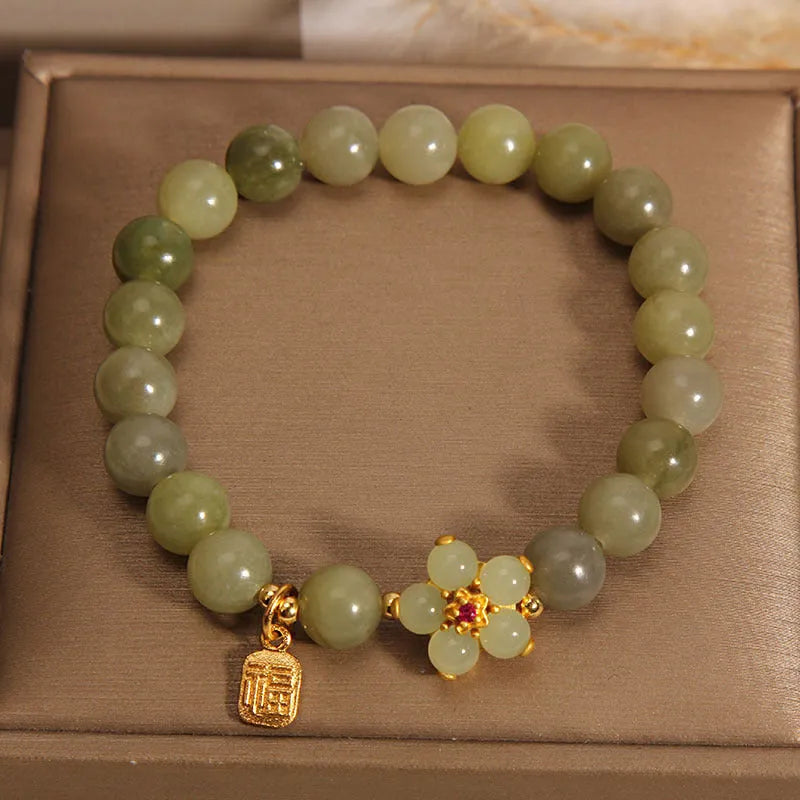 Women's casual alloy bracelet with grey jade stone accent on wrist