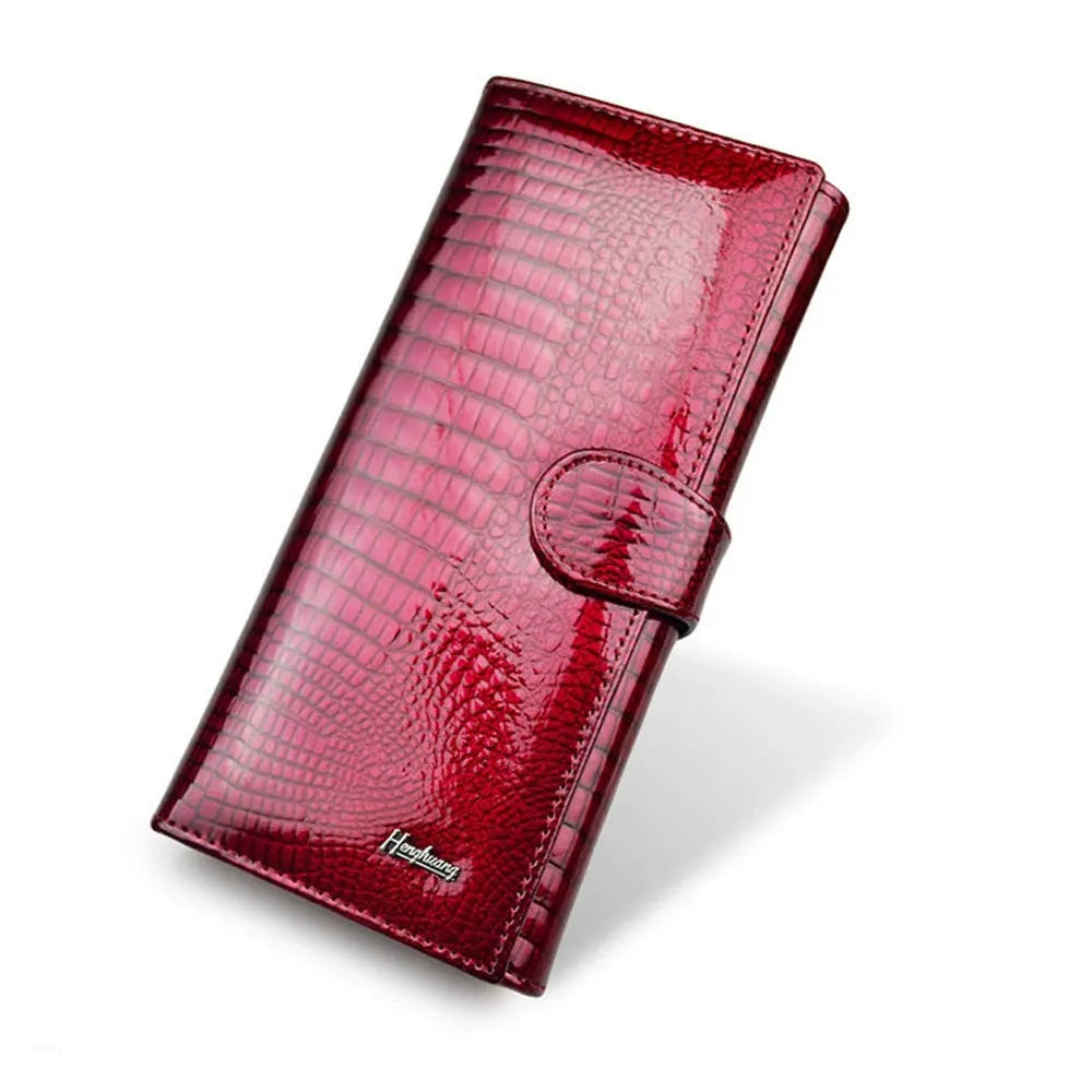 Women's patent leather coin purse with crocodile pattern texture in red colour