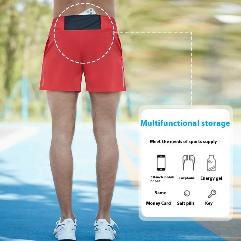 Men's loose-fitting off-road running shorts in black, shown for marathon and cross-country training