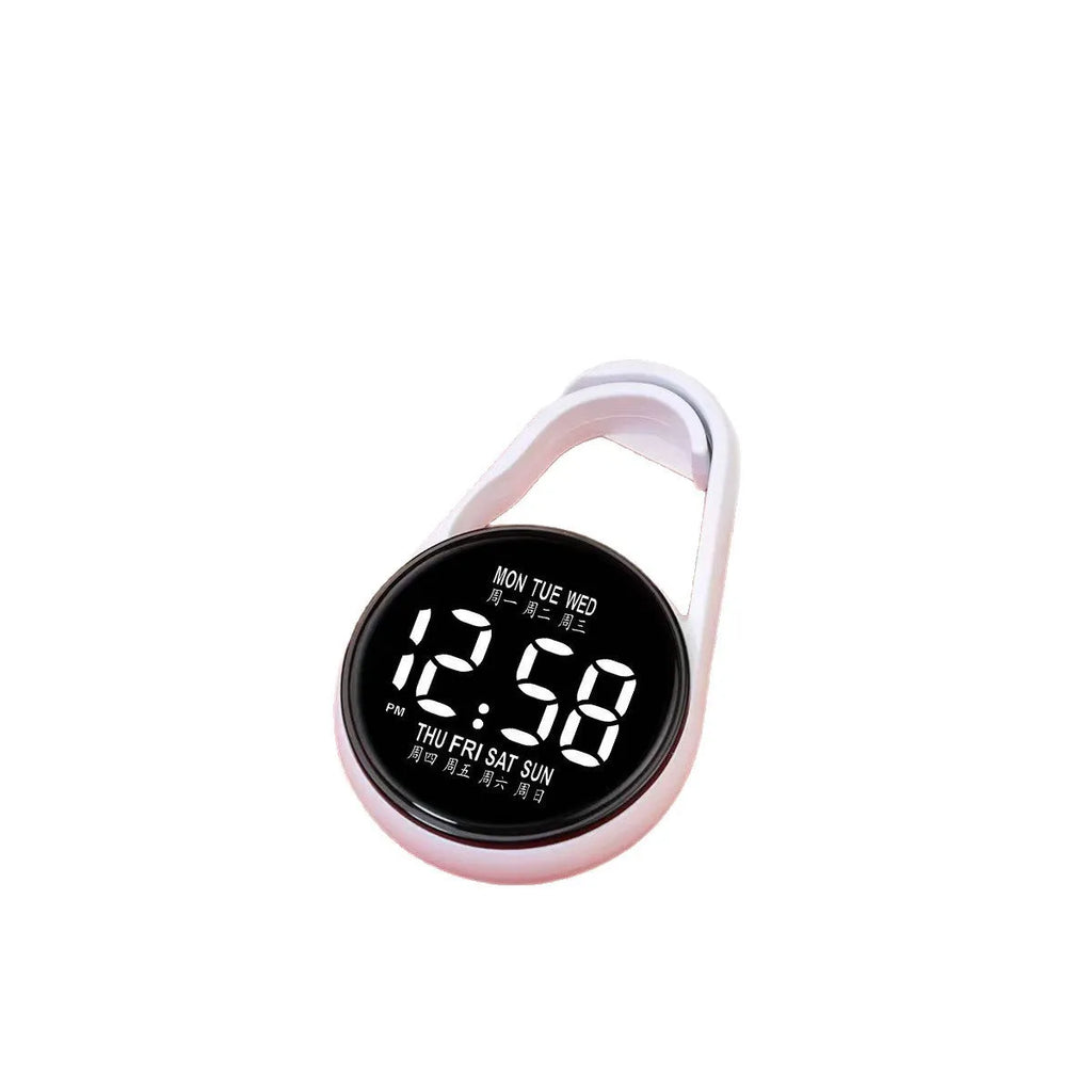LED digital wristwatch showing time and week day on display, with plastic strap.