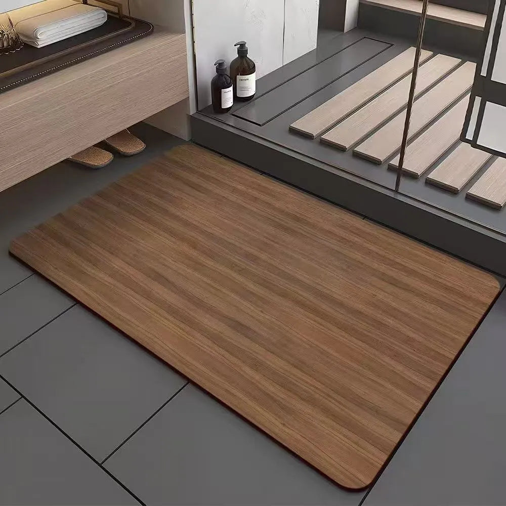 Square diatom mud bathroom floor mat with a brown wood grain geometric pattern on a tiled floor.