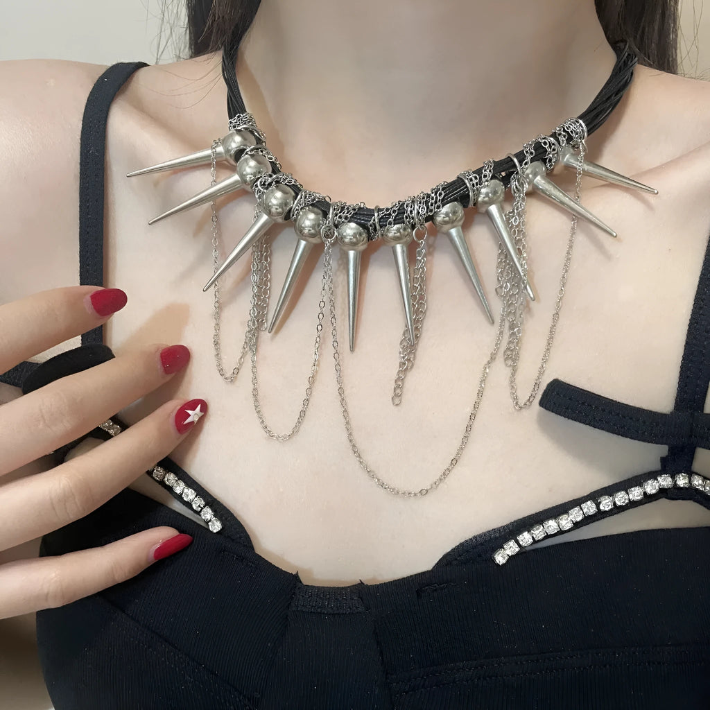 Leather necklace with winding tassel, round beads and point rivet details in electroplated picture colour