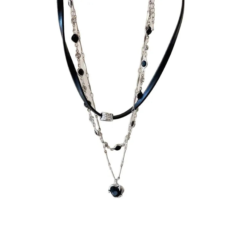 Women's multi-layer necklace set with adjustable leather heart pendants on alloy chain