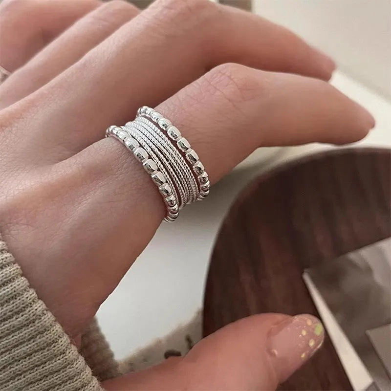 Adjustable opening copper ring with geometric woven twisted multilayer design for women