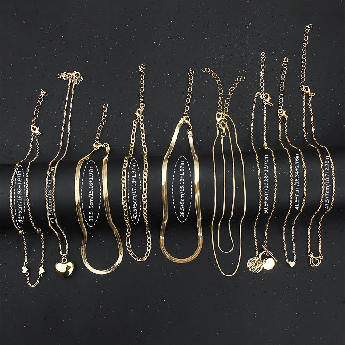 10-piece gold necklace set for women with adjustable snake bones chain and simple alloy pendants