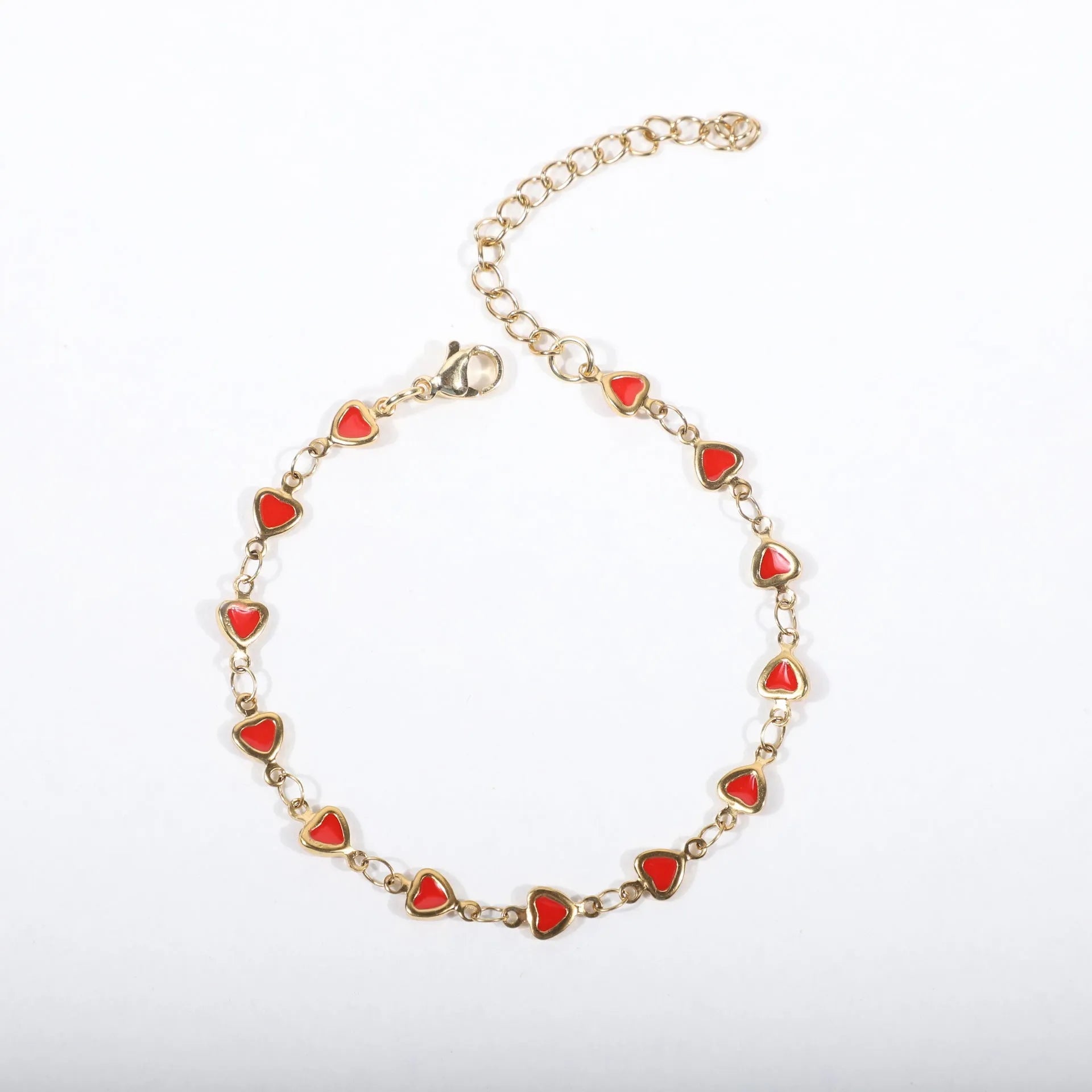 Adjustable stainless steel heart bracelet with 18K gold plating in multiple colour options showing length adjustment