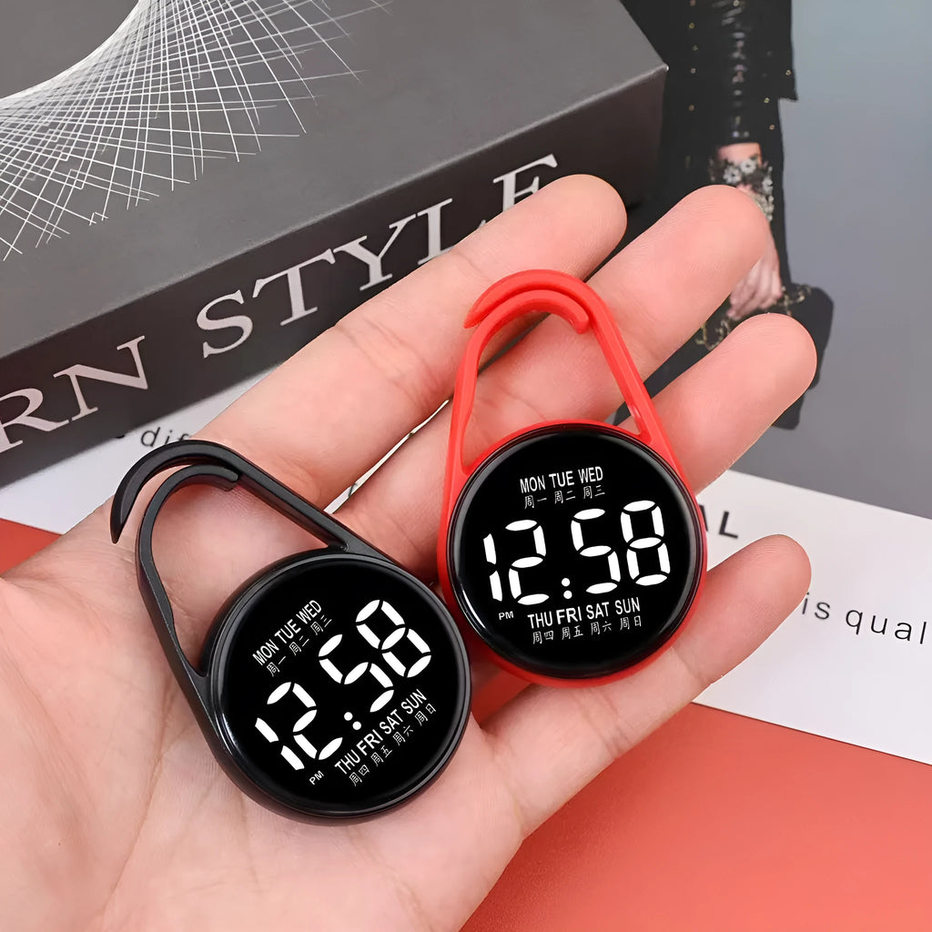 LED digital wristwatch showing time and week day on display, with plastic strap.