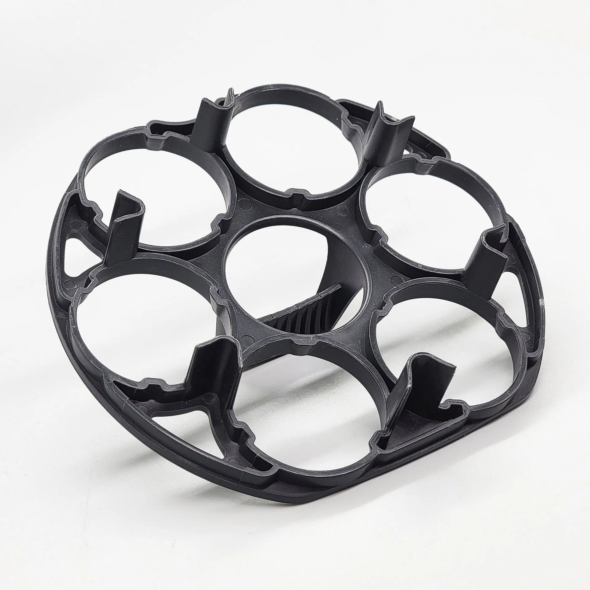 Black plastic egg holder basket with retainer, dimensions 13.8 by 12.6 cm.