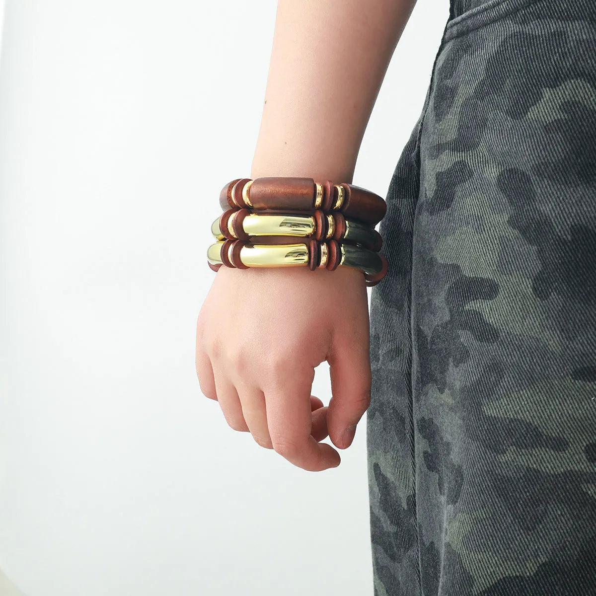 Women's multi-layer wooden necklace and bracelet set with alloy construction and circular design elements