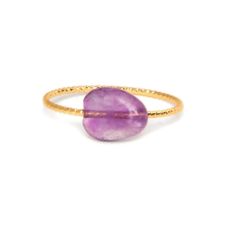 Geometric shaped agate ring for women on a hand, showing original design and coloured stone.