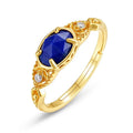 Women's oval geometric silver ring with deep blue lapis lazuli stone and round elements