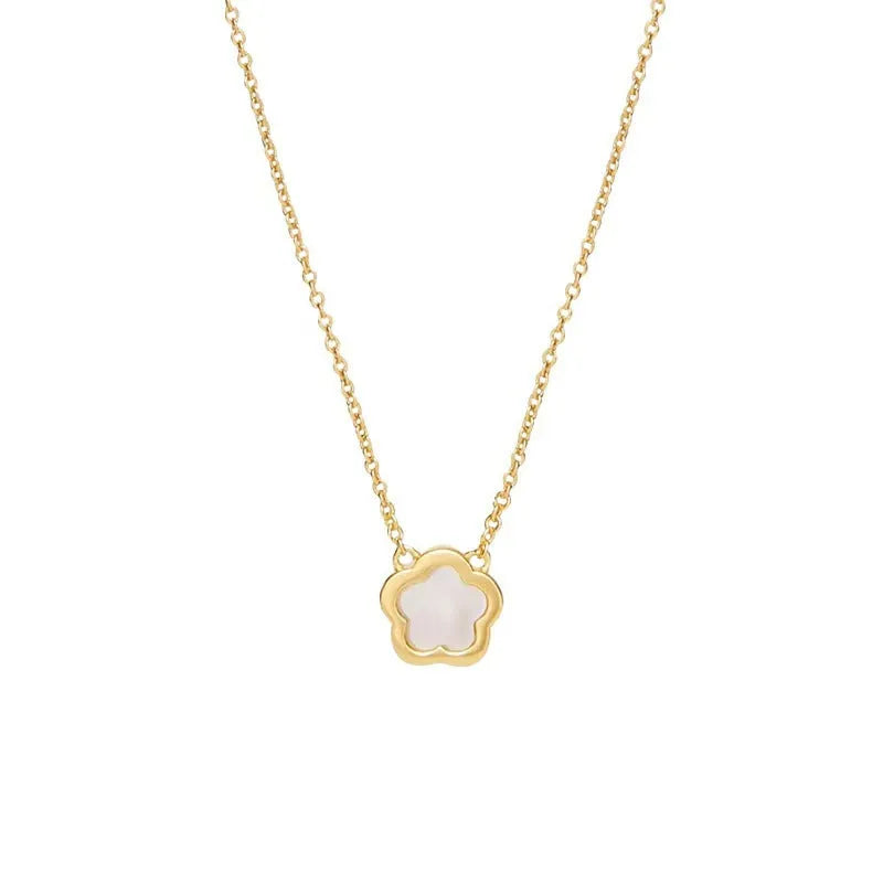 White mother of pearl flower pendant necklace on a gold-coloured chain for women.