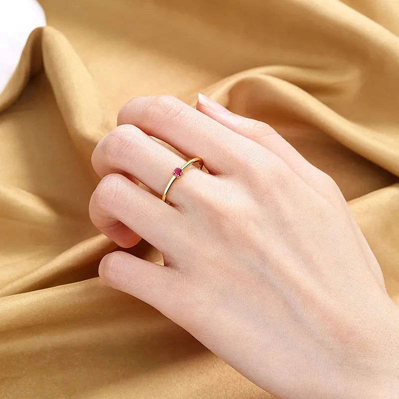 Women's geometric circle ring with single diamond in copper, available in multiple colours and sizes