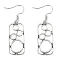 Geometric round ring earrings with irregular square shape in antique silver colour