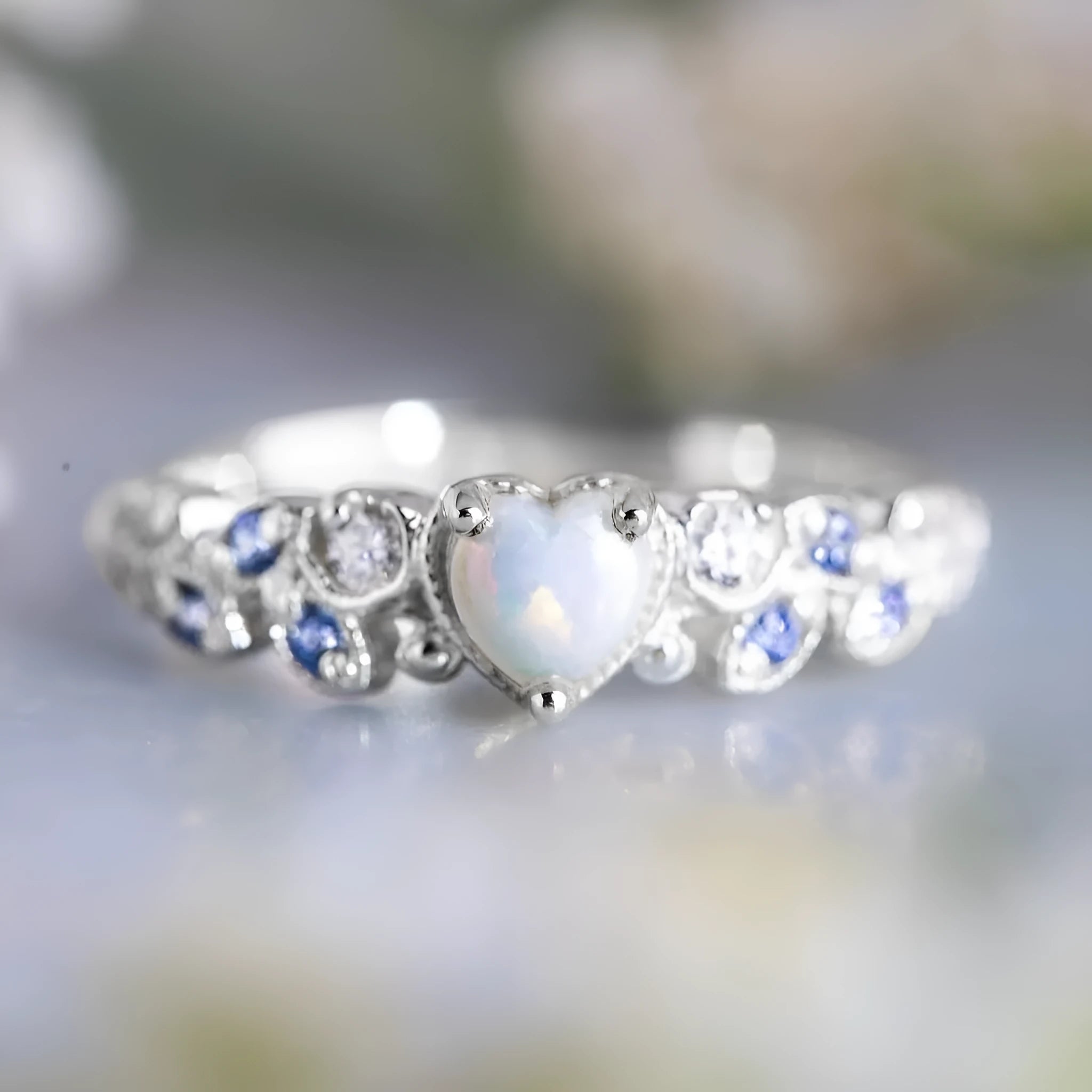 Peach coloured heart-shaped women's ring with floral opal ocean design on electroplated alloy