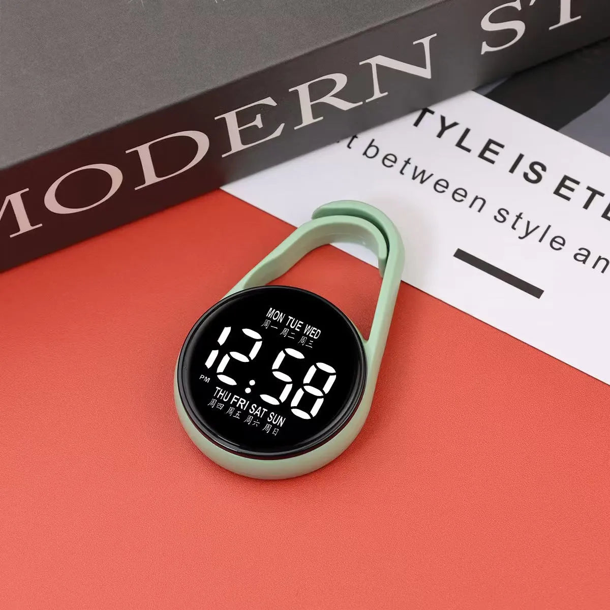 LED digital wristwatch showing time and week day on display, with plastic strap.