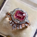 Rose gold geometric women's fashion ring with ruby-style detail in retro design.