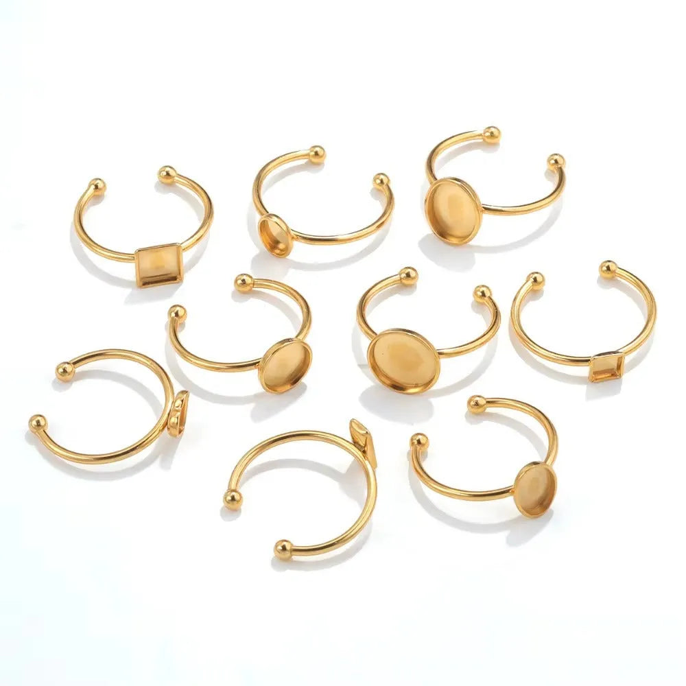 Golden electroplated stainless steel ring settings in various shapes with totem pattern texture and ring holder