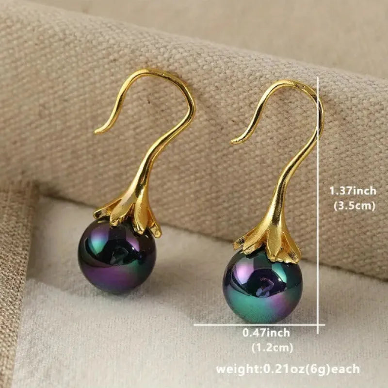 Gold tone retro fashion drop dangle earrings for women with electroplated alloy construction