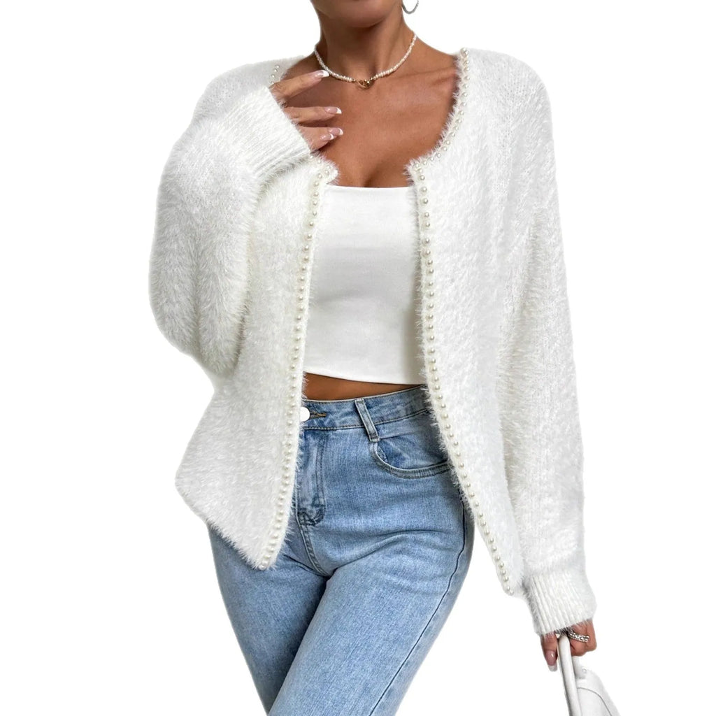White women's V-neck cardigan sweater in polyester knit fabric