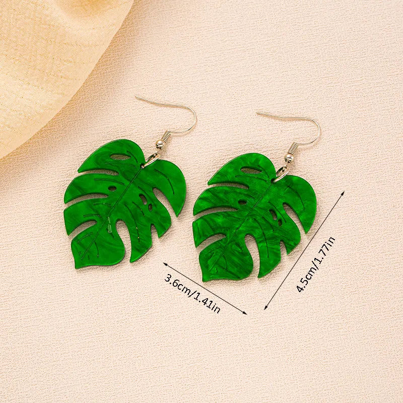 Acrylic drop shape earrings with a coconut design in one of five colour styles on alloy hooks.