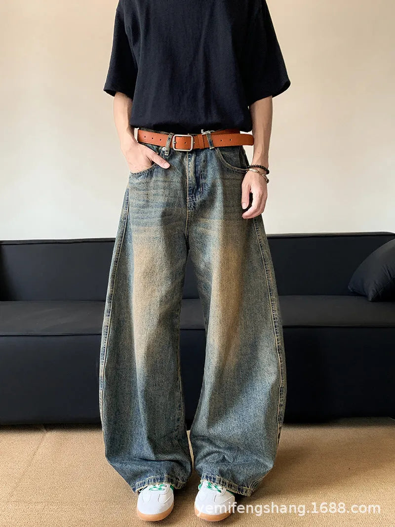 Men's retro blue distressed slim-fit wide-leg jeans on a model