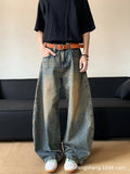 Men's retro blue distressed slim-fit wide-leg jeans on a model
