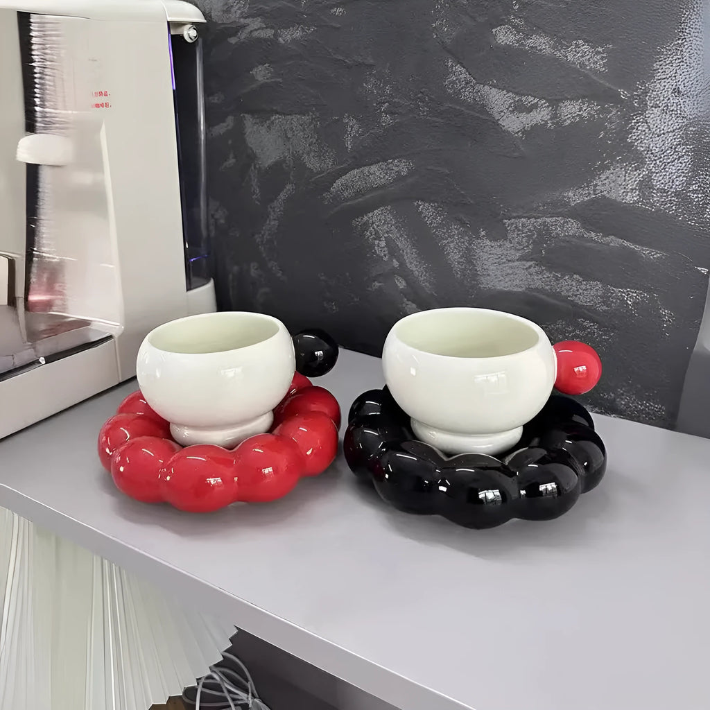 Ceramic coffee set with a 250ml cup and matching dish in a simple solid colour design.