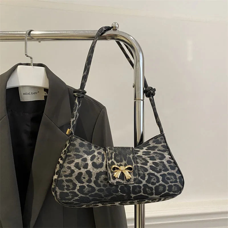 Casual PU leather handbag with sandwich pocket in black colour showing dimensions and design